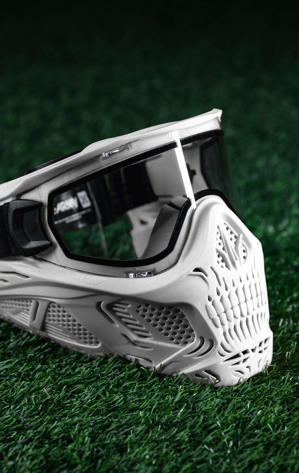 Strap and clear lens not included.