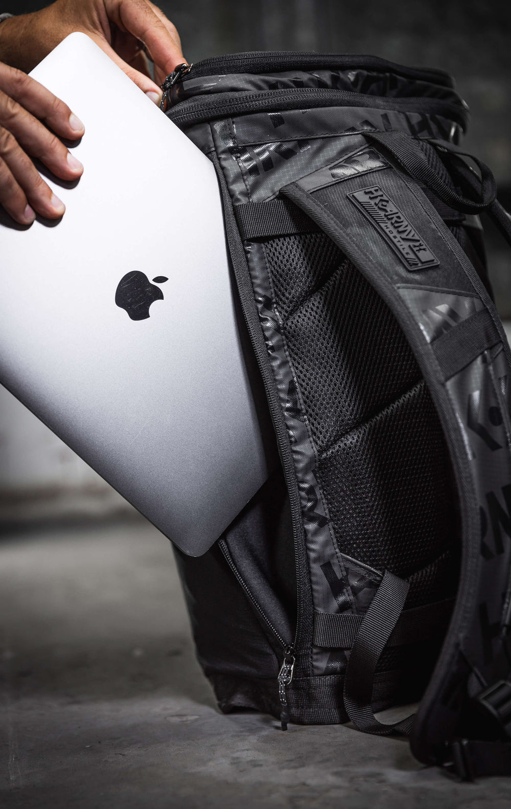 Shock-absorbent laptop sleeve with side and vertical access.